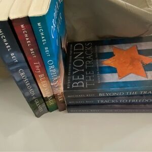 Michael Reit Paperback Book Set - Blue & Orange Accents